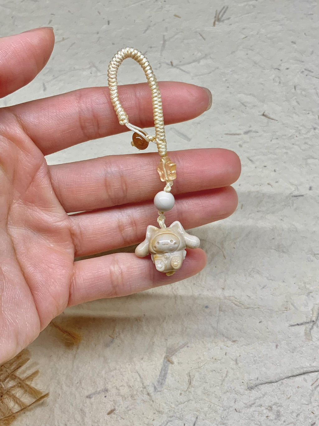 Alashan agate carved dog charm natural stone detail