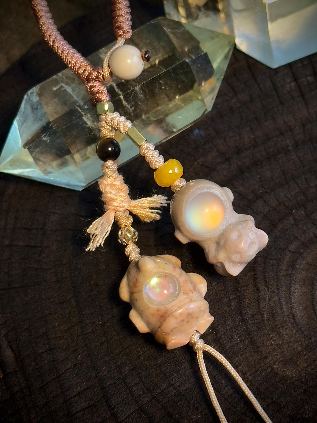 Handwoven astronaut and rocket natural stone charm