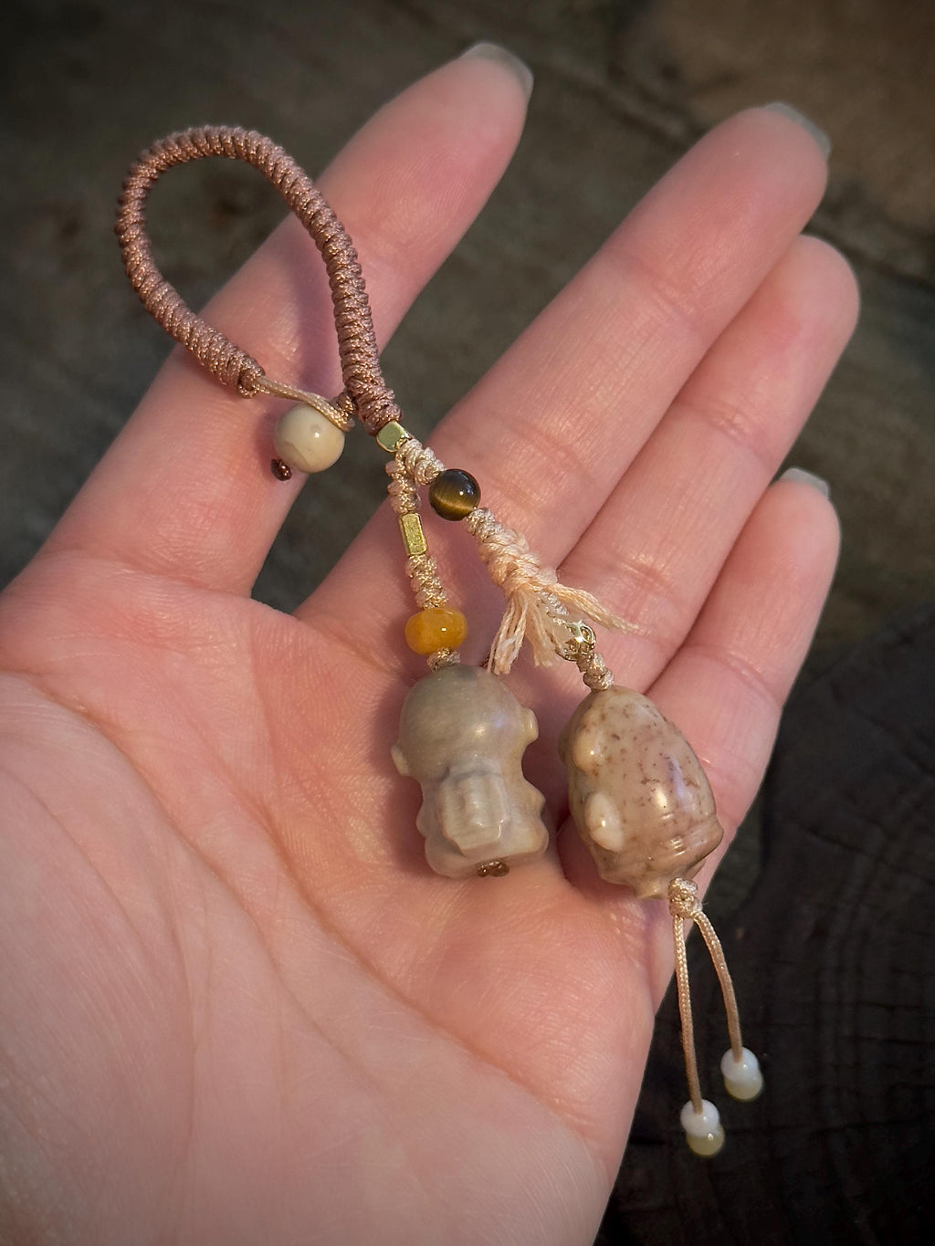 Natural Alashan agate rocket charm close-up