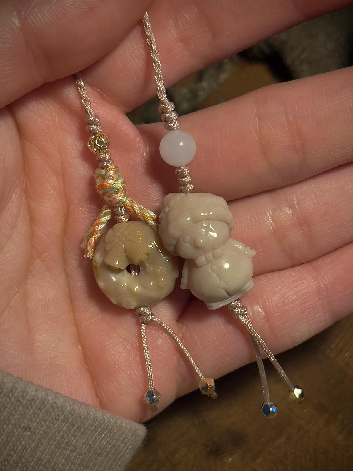Snowman and wreath natural stone holiday charm close-up