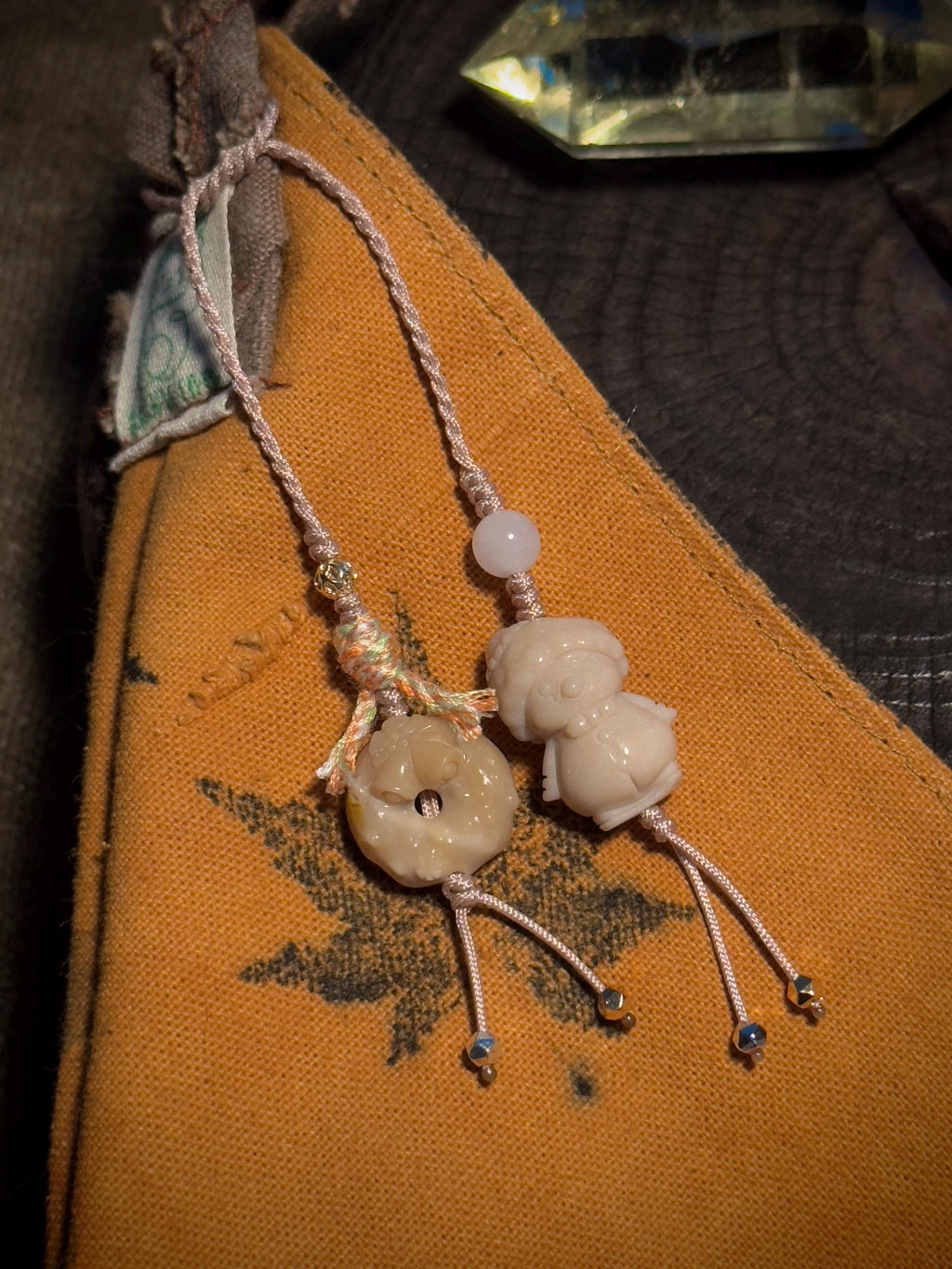 Natural stone snowman and wreath bag charm detail