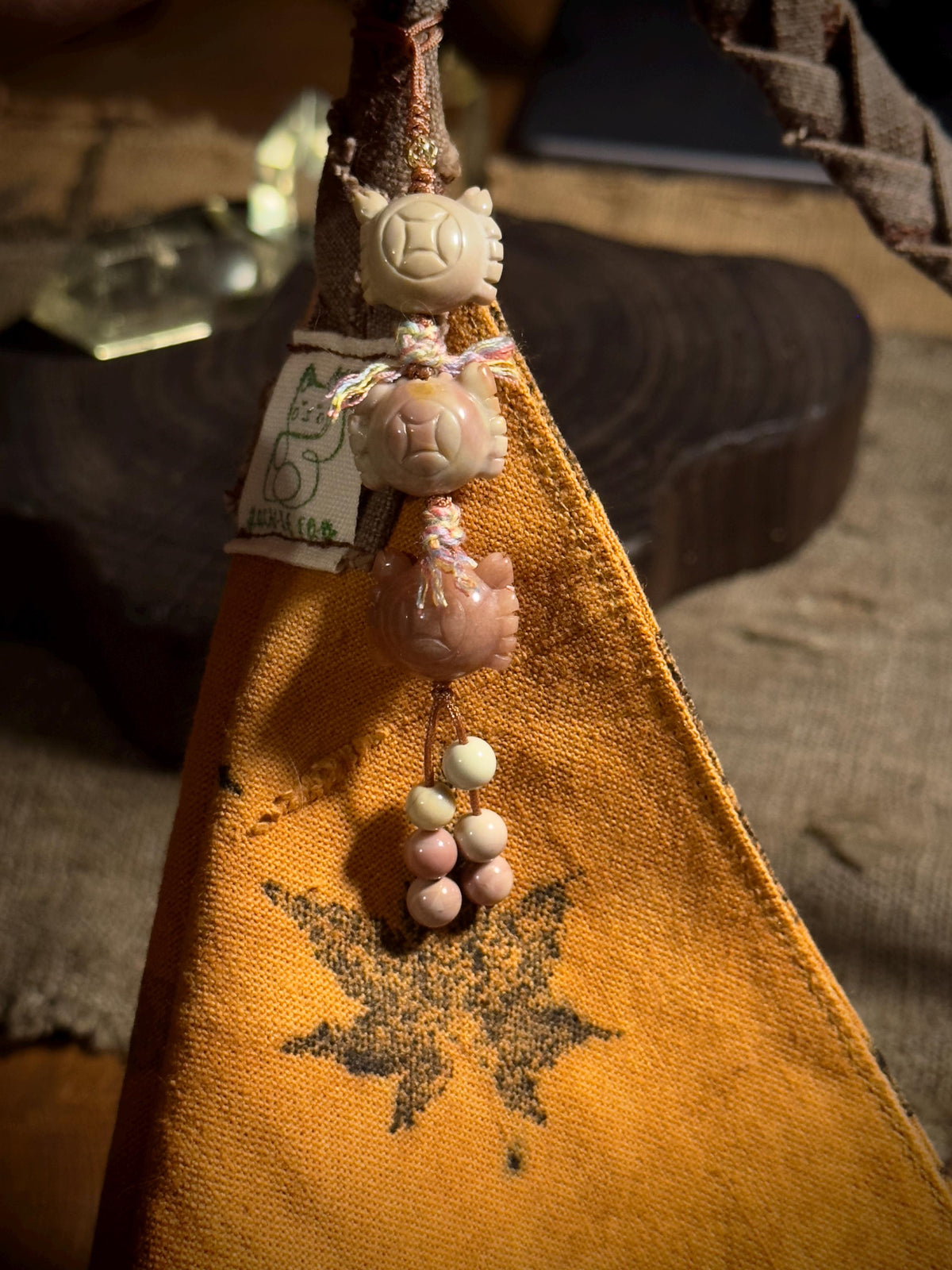 Handwoven crab coin Alashan agate charm detail
