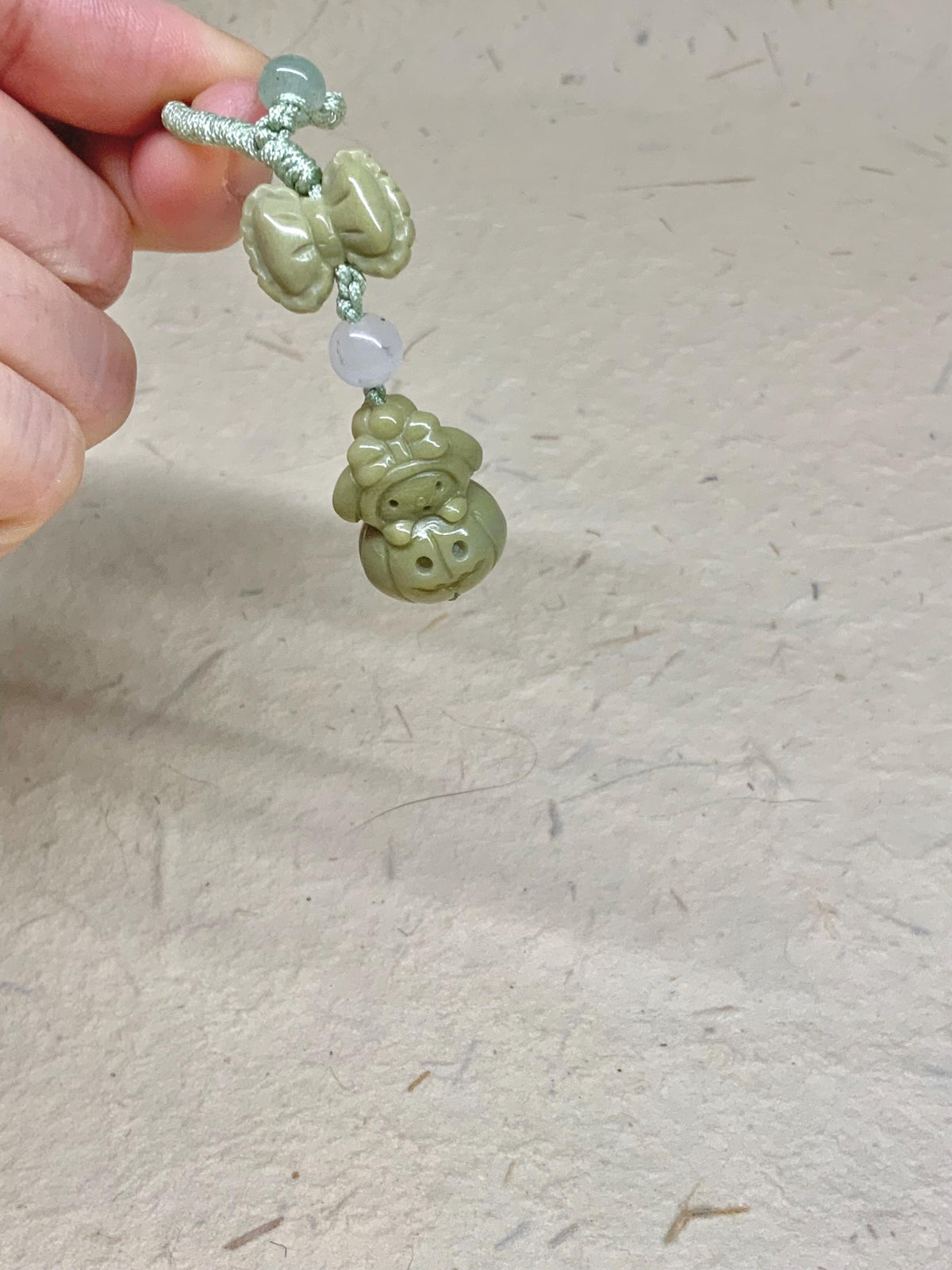 One-of-a-kind green carved Alashan agate charm