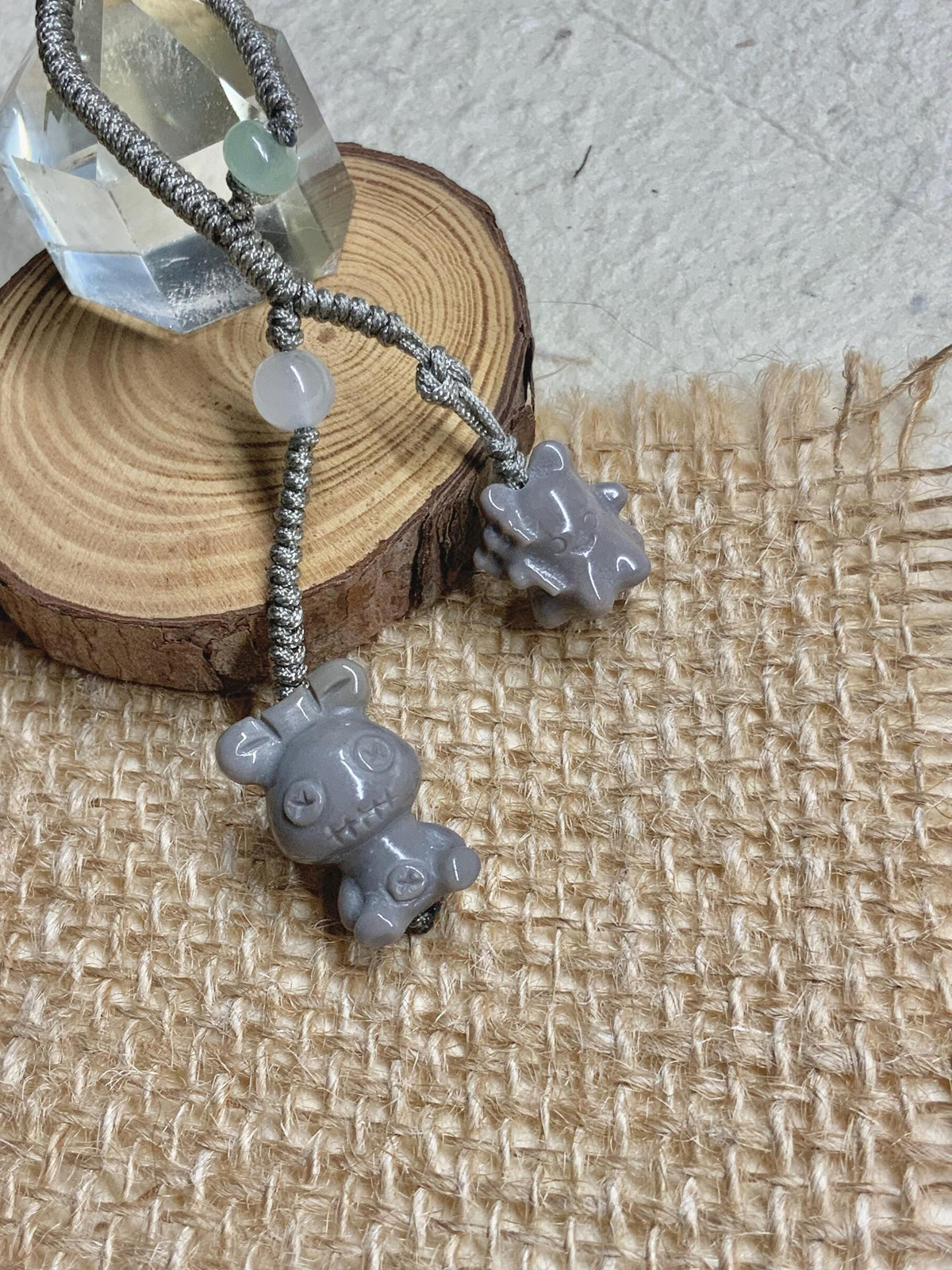 Grey doll and ghost carved Alashan agate handwoven charm