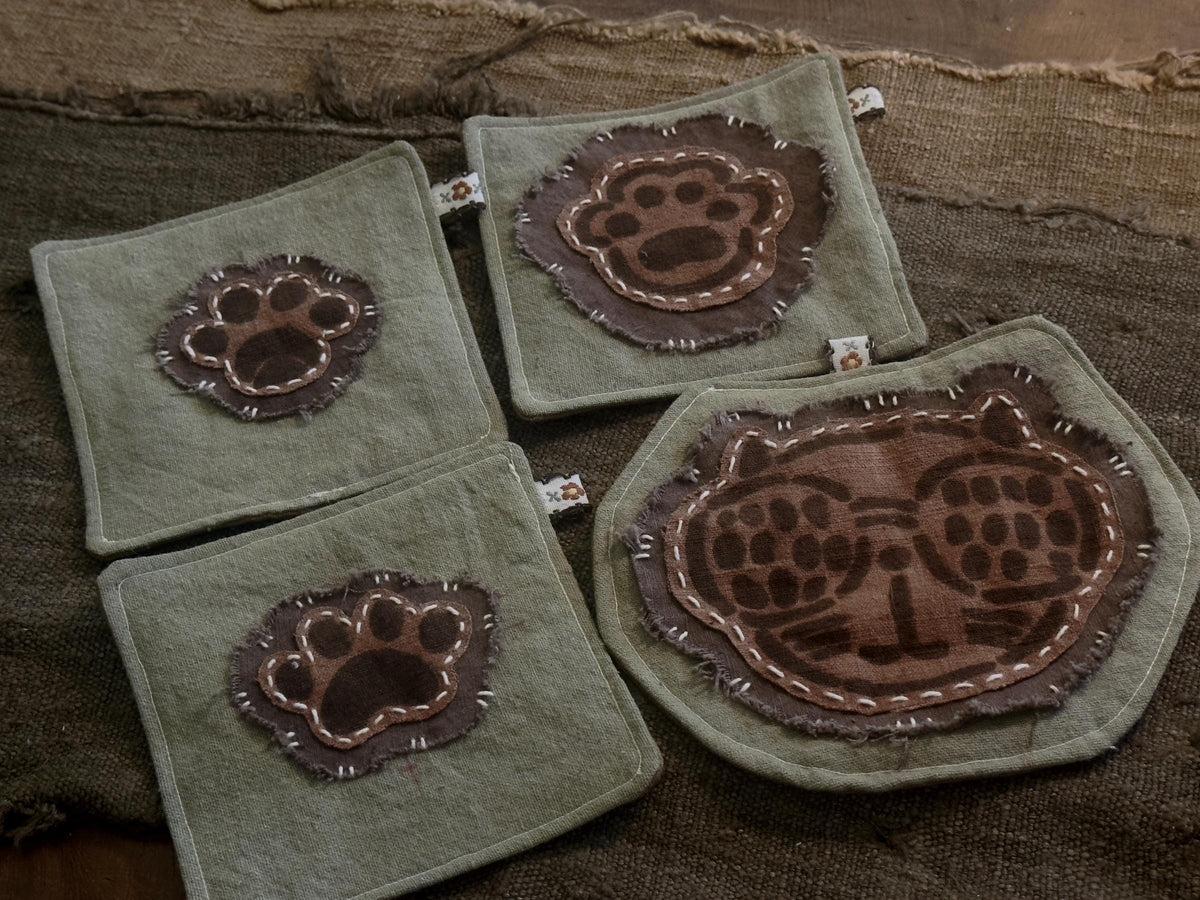 Wabi-Sabi plant-dyed cat paw and botanical coasters – set of 4