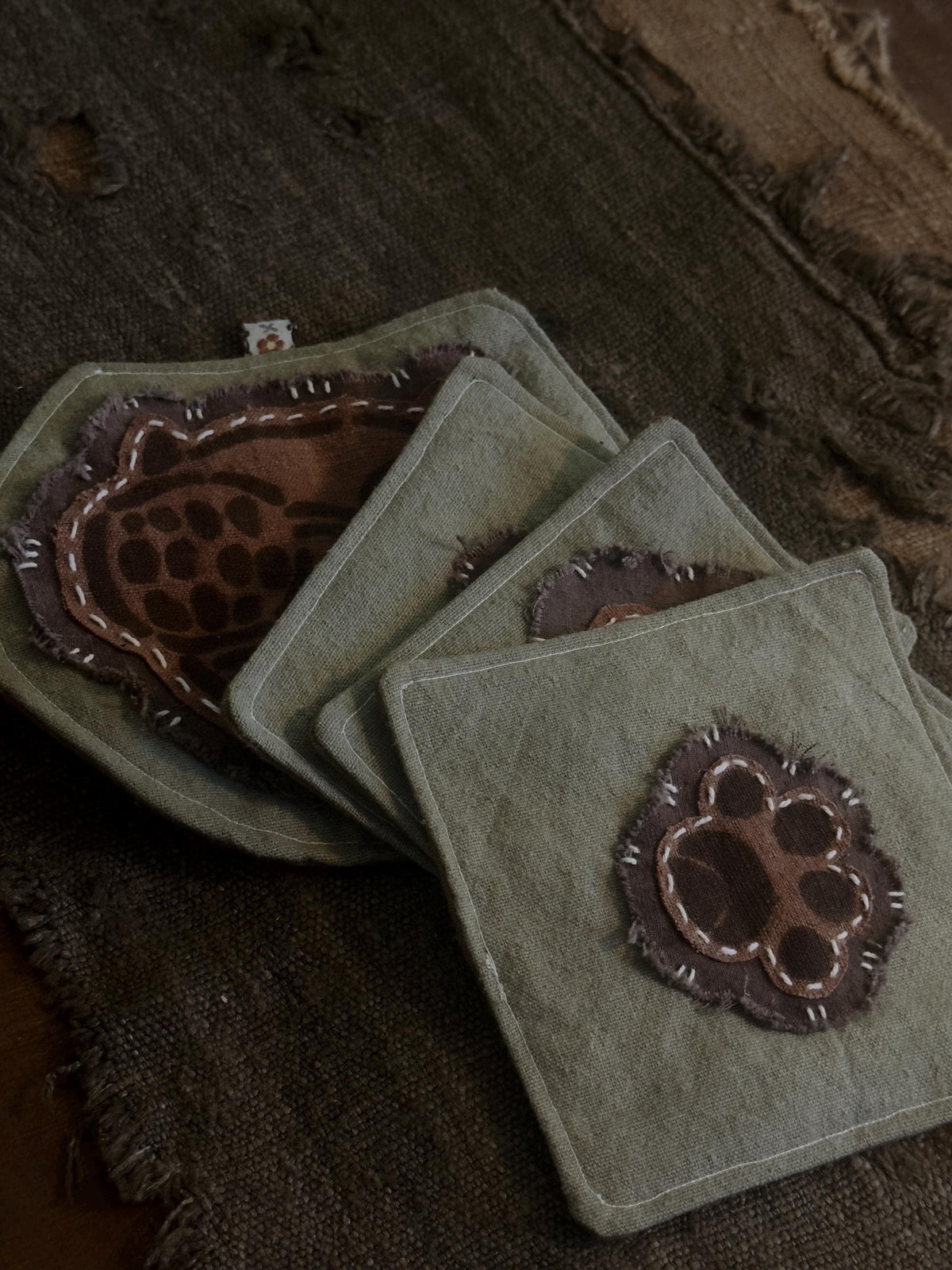 Plant-dyed cotton cat paw and botanical coaster – detail 6