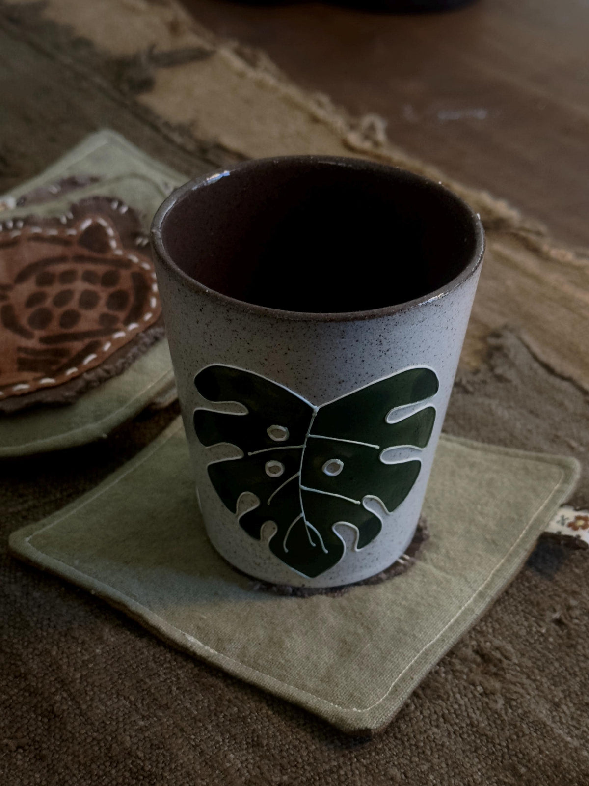 Plant-dyed cotton cat paw and botanical coaster – detail 5