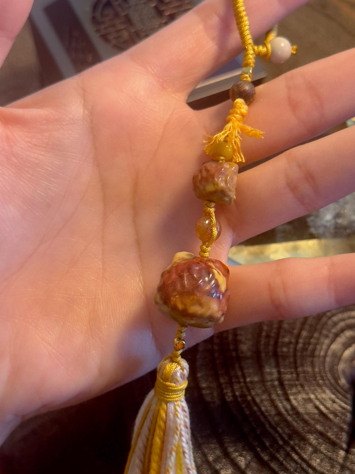 Natural Alashan agate lion dance pendant detail