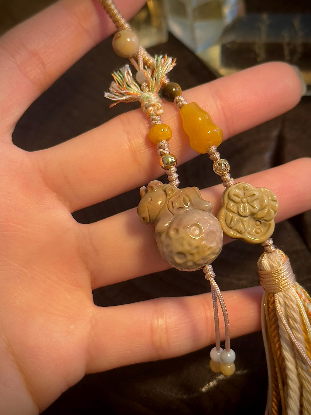 Lucky Money Horse carved stone bag charm close-up