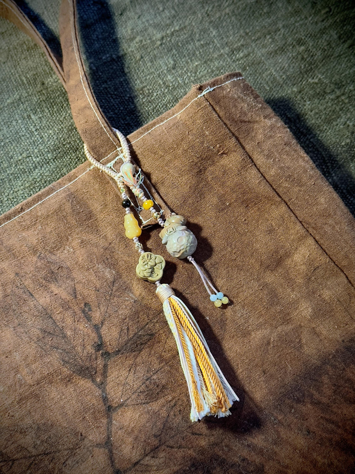 Natural stone horse charm with jade and Tiger's Eye