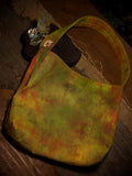 Natural plant dyed cotton shoulder bag in earthy orange olive and green tones