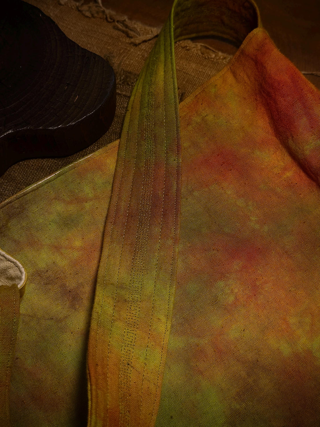 Natural plant dyed cotton shoulder bag in earthy orange olive and green tones