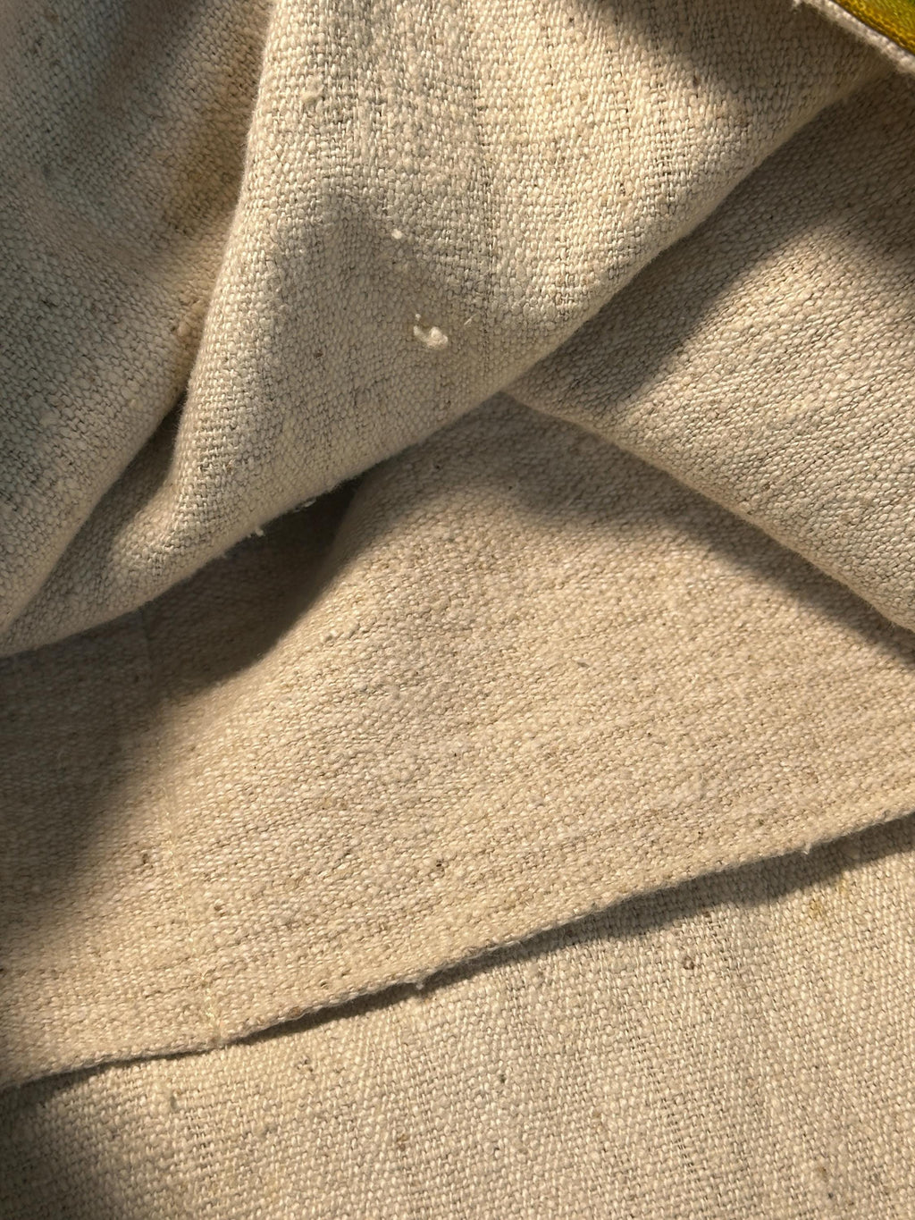 Natural plant dyed cotton shoulder bag in earthy orange olive and green tones