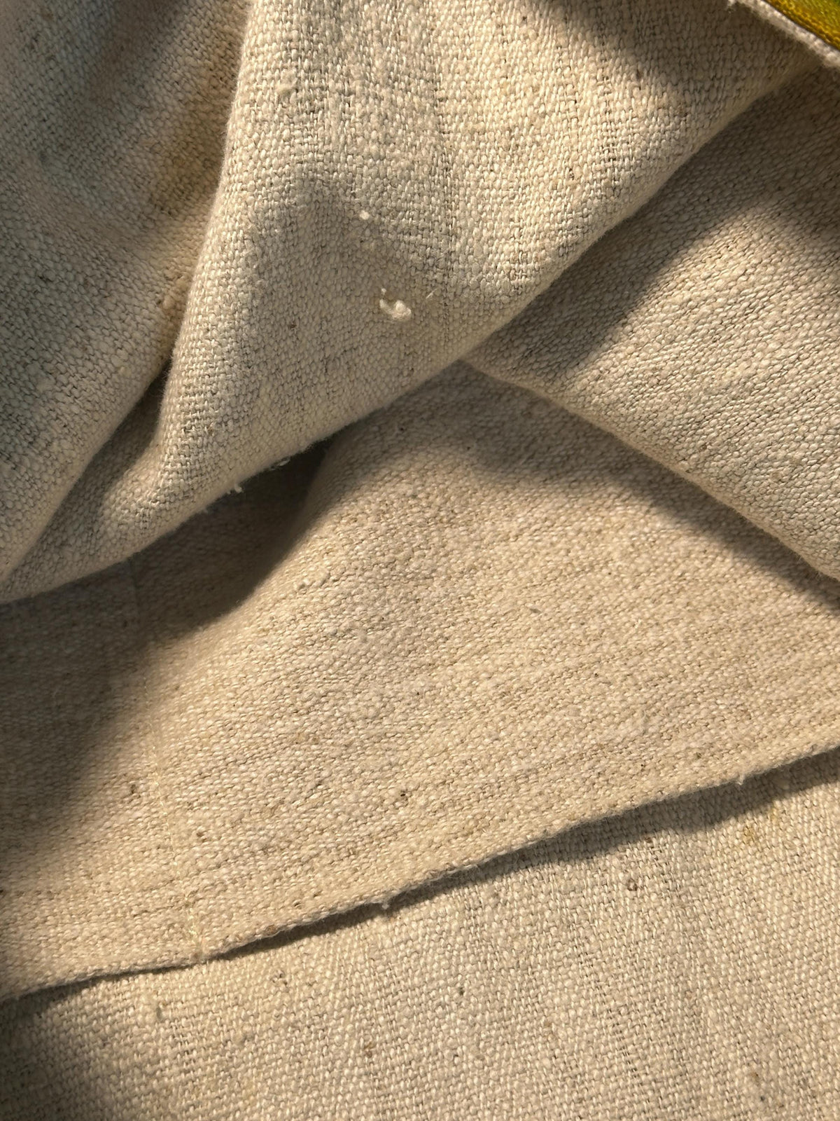Natural plant dyed cotton shoulder bag in earthy orange olive and green tones