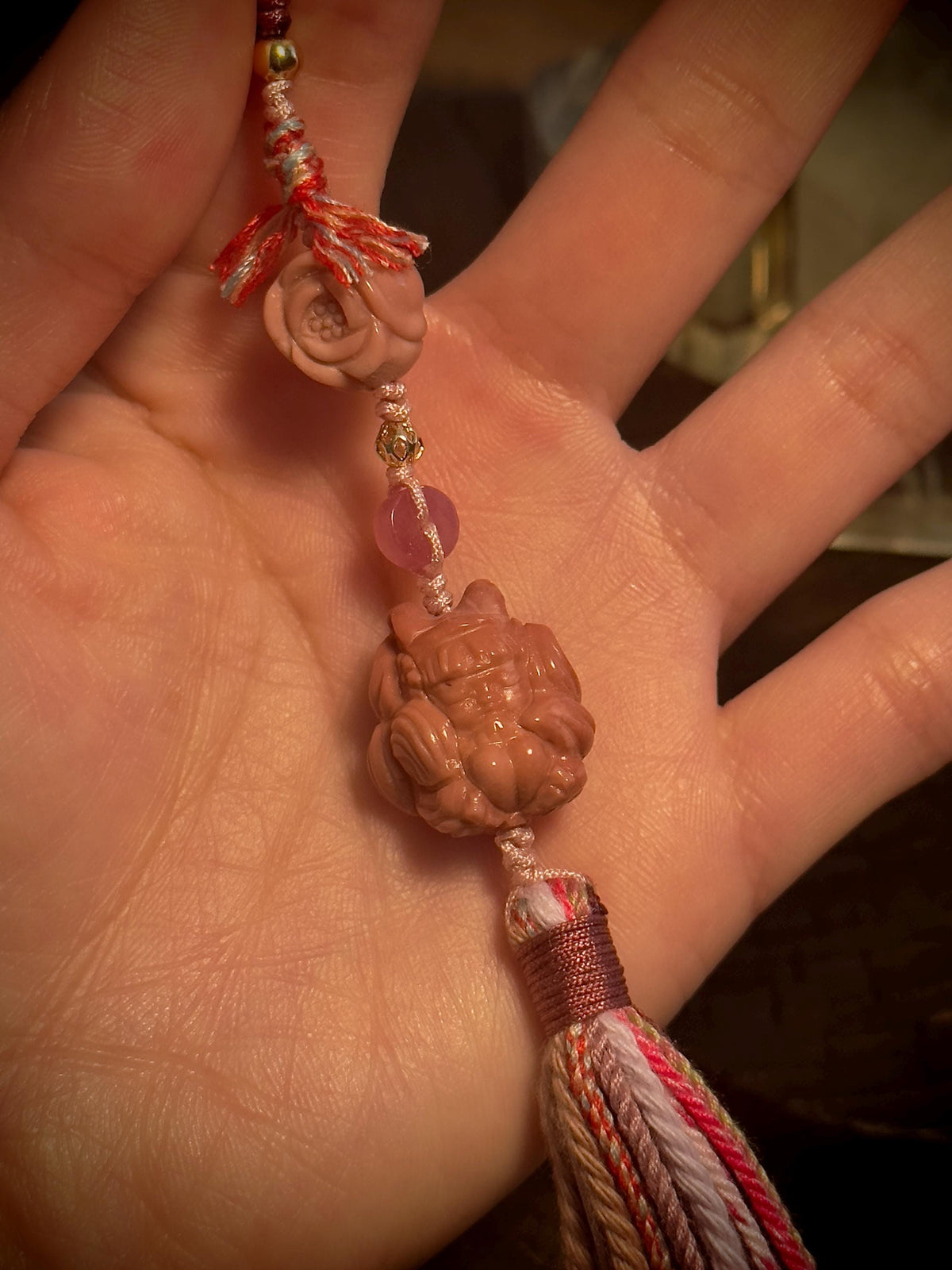 Handwoven pink nine-tailed fox Alashan agate charm detail