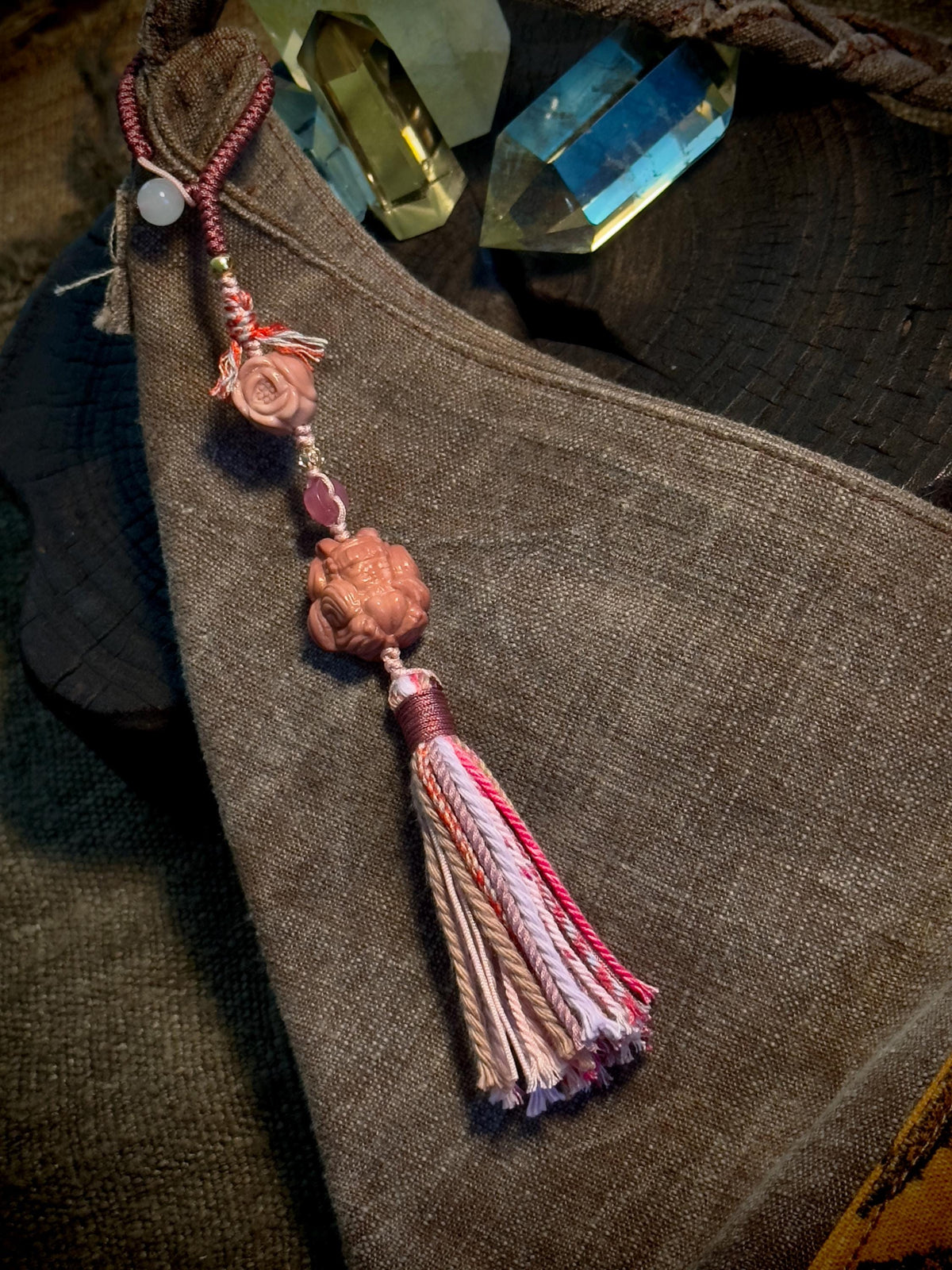 Pink nine-tailed fox handwoven bag charm detail