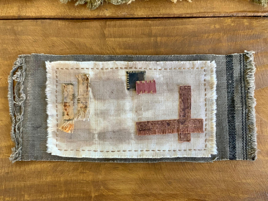 Plant-dyed hand-stitched small tea mat detail