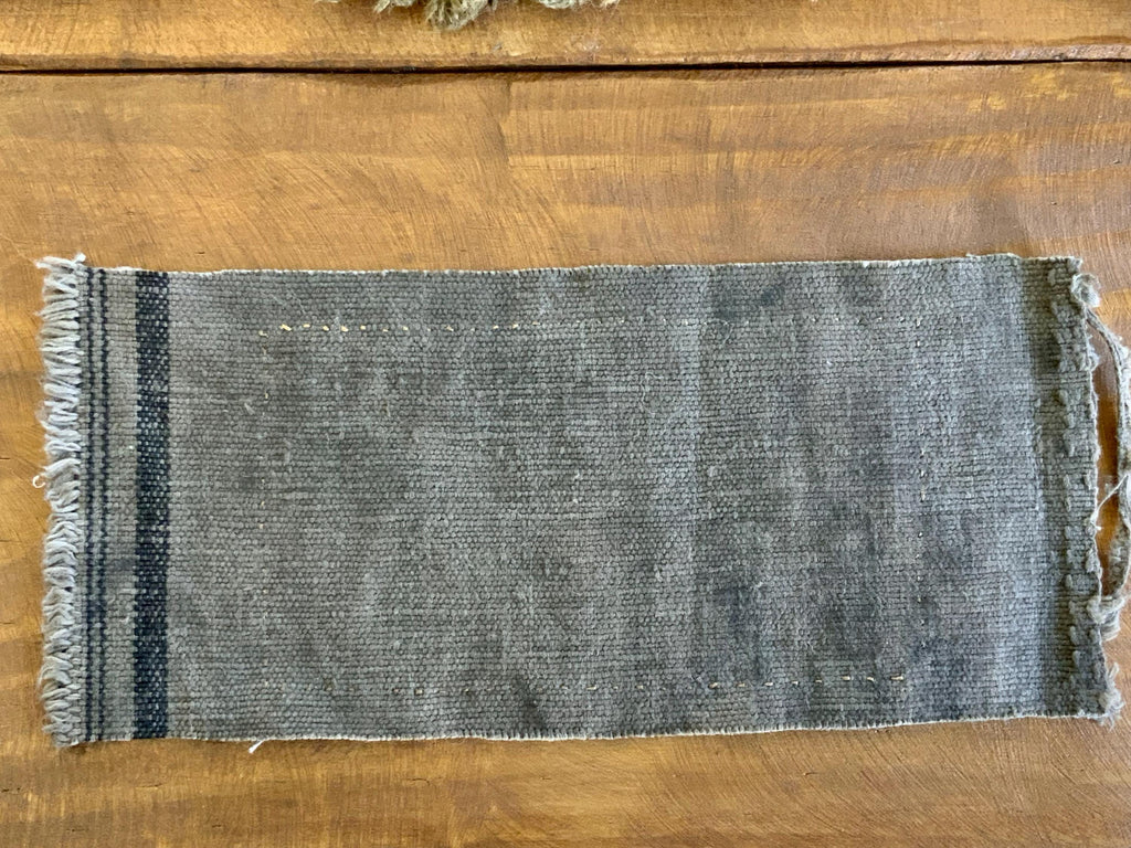 Plant-dyed small tea mat natural textile detail