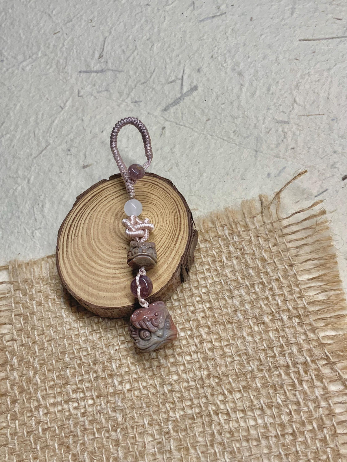 Natural Alashan agate lion dance pendant detail