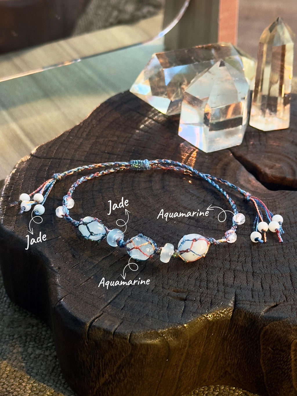 Natural raw aquamarine stones and jade bracelet detail