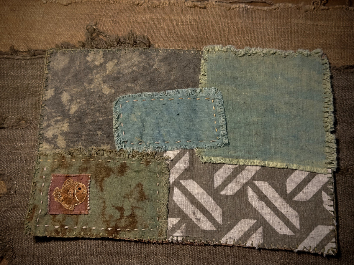 Full front view showing patchwork layout and natural textile irregularities