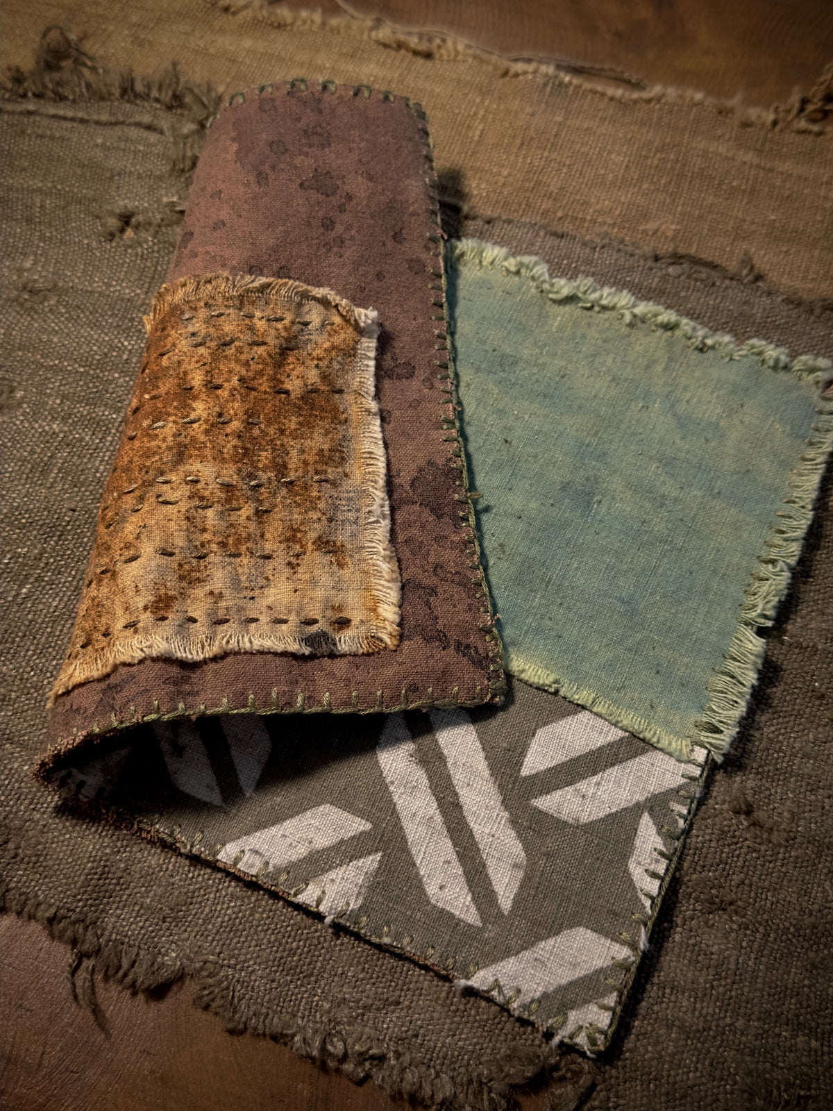 Folded tea mat showing flexibility, raw edges and hand stitching