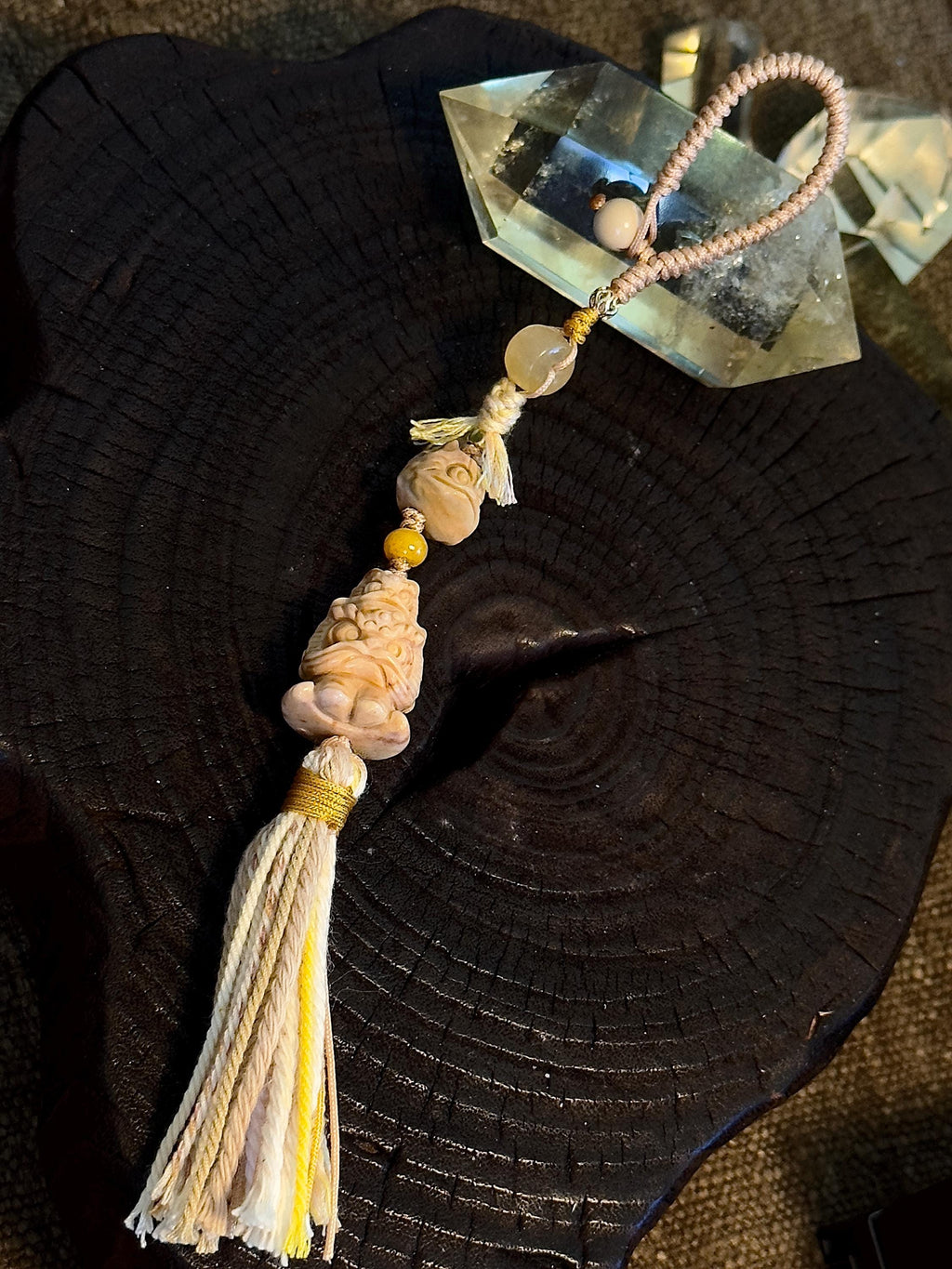 Alashan agate lion dance carved charm detail
